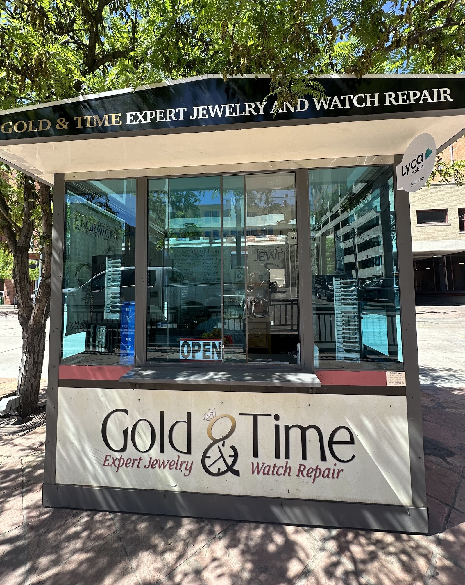 The Gold & Time repair kiosk on the 16th Street Mall, Denver
